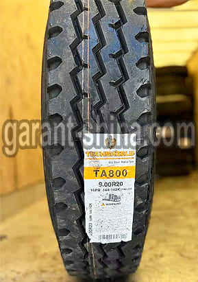 Techshield TA800 (универсальная) 9.00 R20 144/142K 16PR - Фото реального протектора с этикеткой вблизи